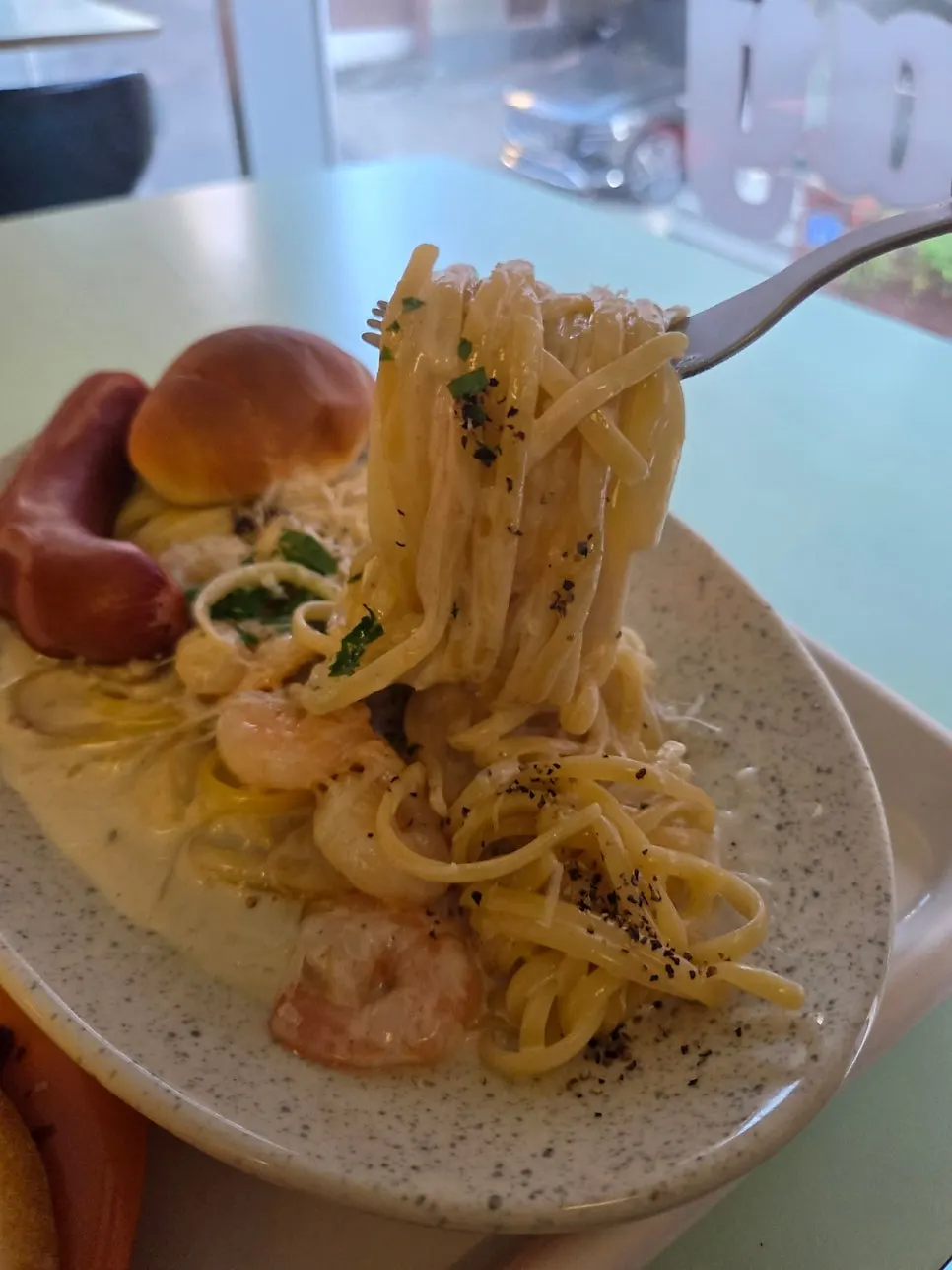 A solo dinner spread of pasta and pizza