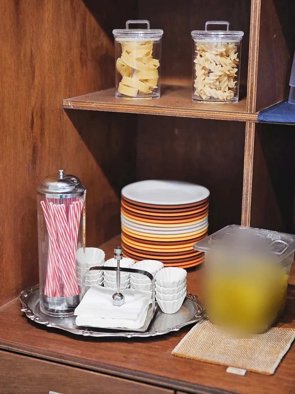 Self-service bar with pickles and napkins