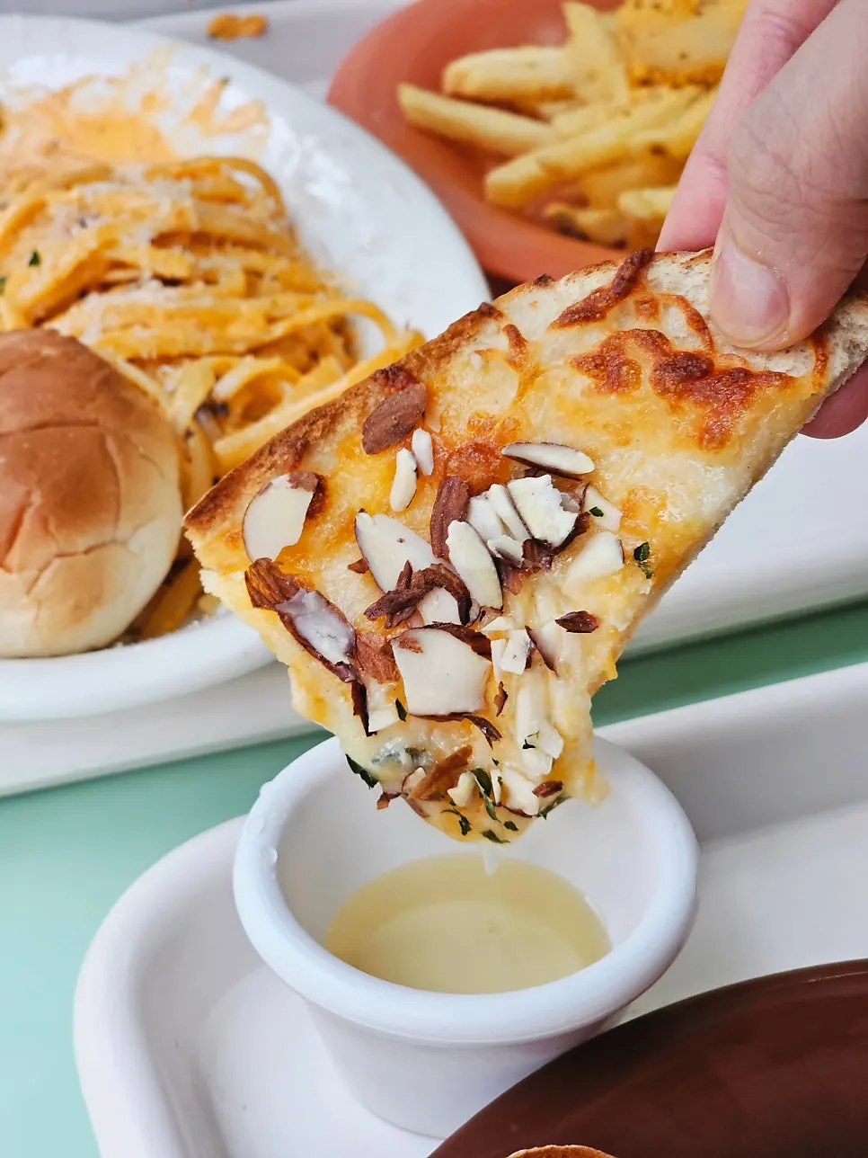 Gorgonzola pizza topped with almonds and honey