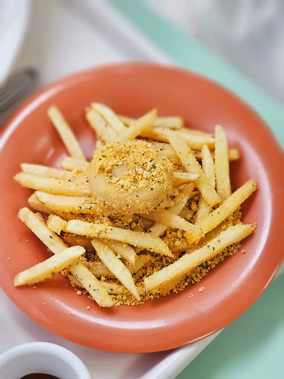 Seasoned fries dusted with cheese powder