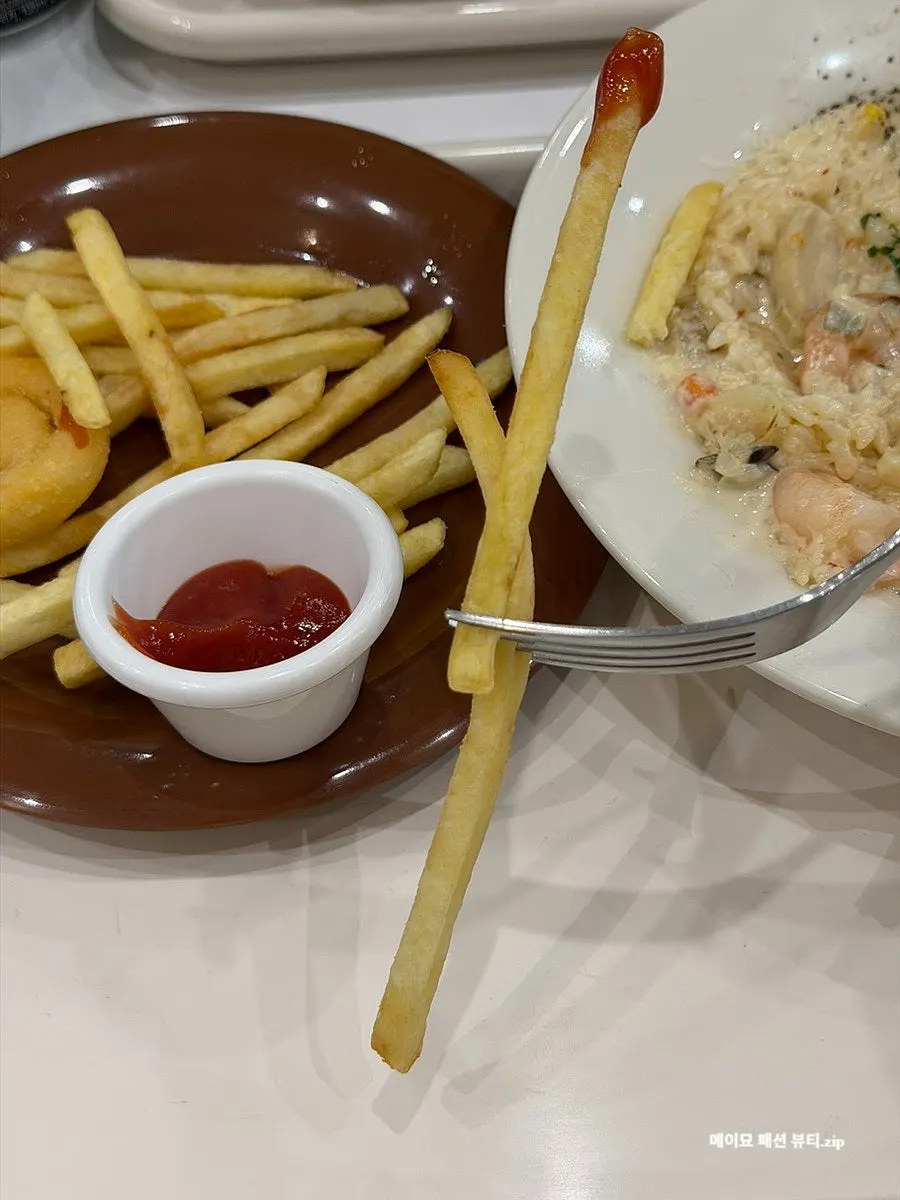 Spoonful of risotto lifted up