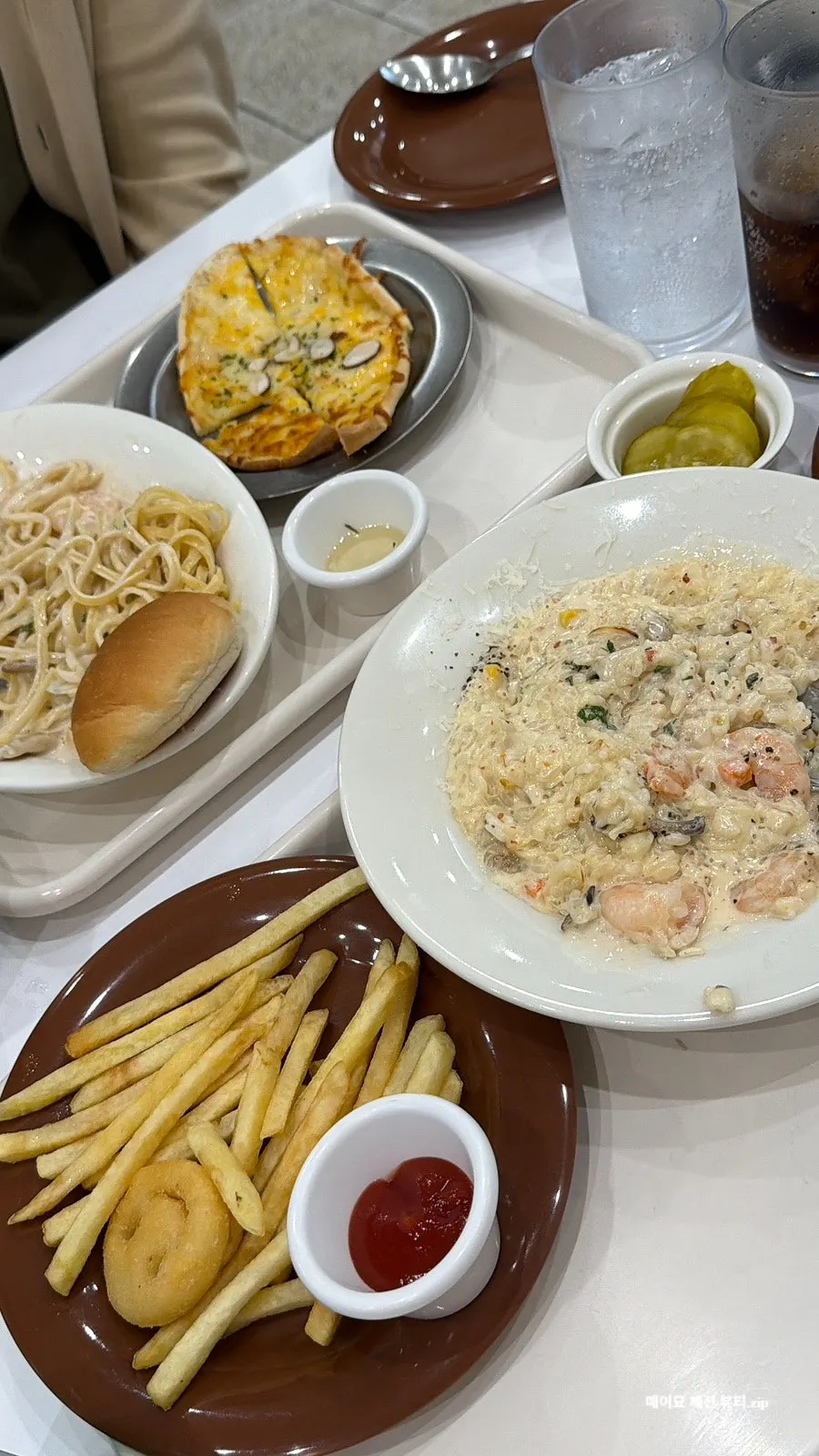 Vertical shot of cream sauce pasta