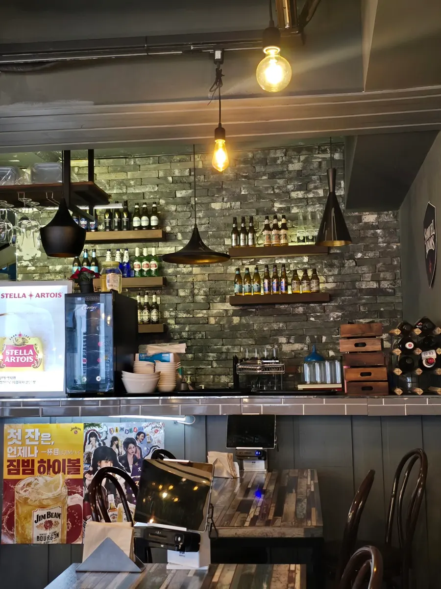 Indoor tables and terrace seating at Pasta Gram Yangjae Main Branch