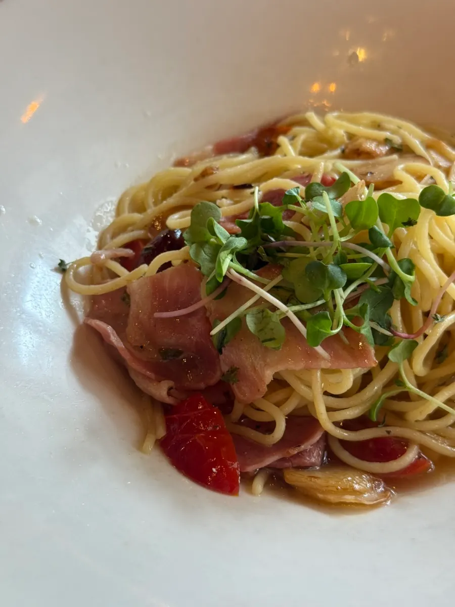 A plate of Pasta Gram's aglio olio pasta