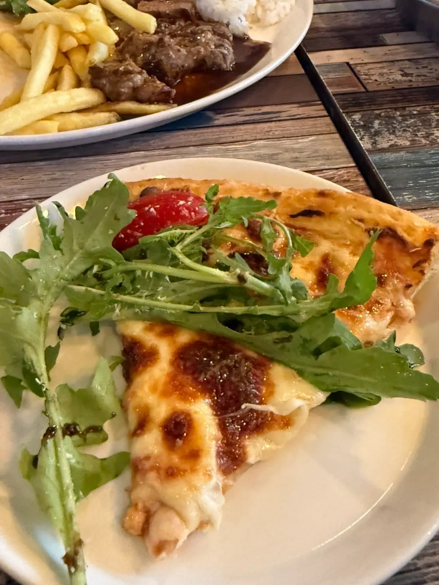 Rucola pizza on the table