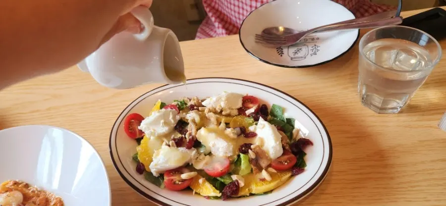 Group shot of pasta, rice bowl, and salad