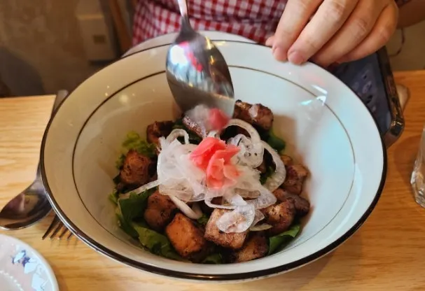 Ricotta cheese salad topped with orange