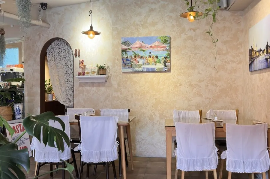 Interior of Pastiar with wooden furniture