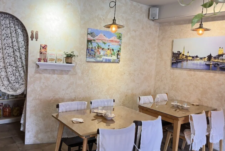 Tables and seating on Pastiar's second floor
