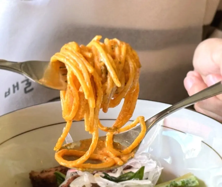 Broad noodles coated in thick Toowoomba sauce