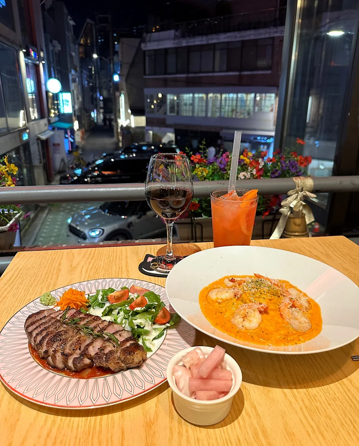 Sous vide steak with tomato sauce and carrot slaw