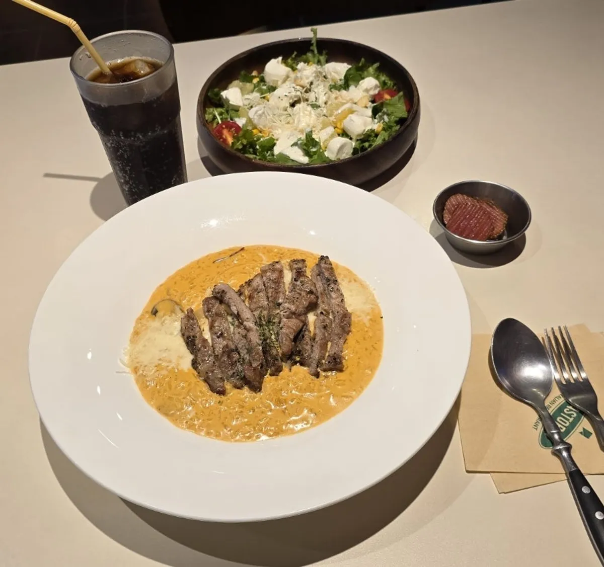Pork jowl toowoomba risotto served with zero-sugar cola