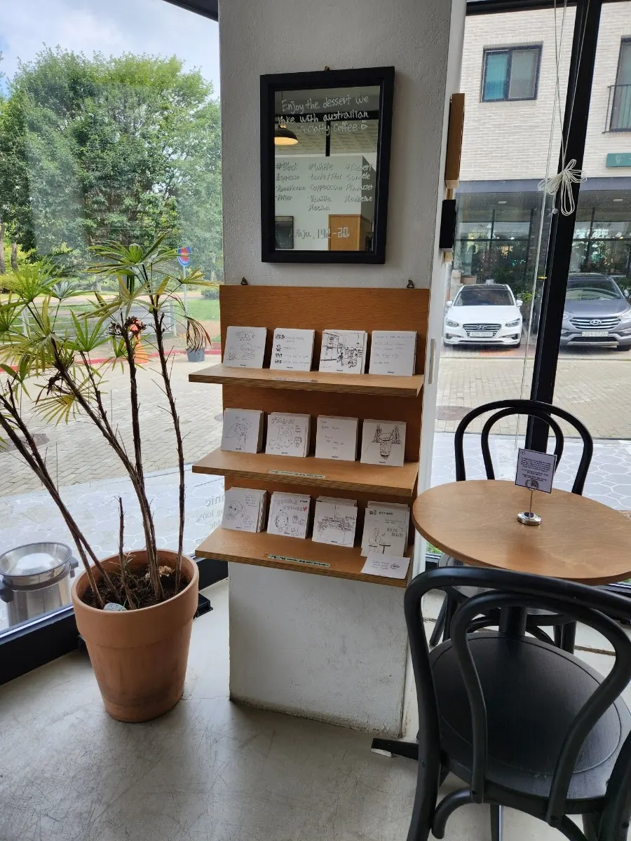 Café corner decorated with tasteful posters and objects