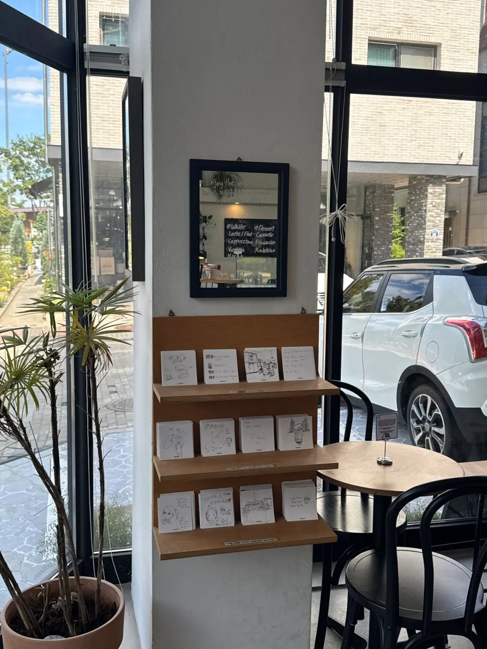 Pound Coffee seating with generous table spacing