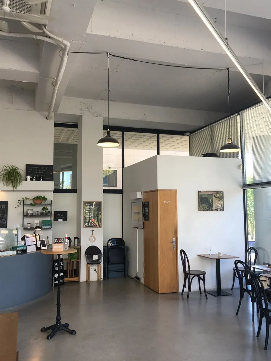 Pound Coffee's modern interior with plants