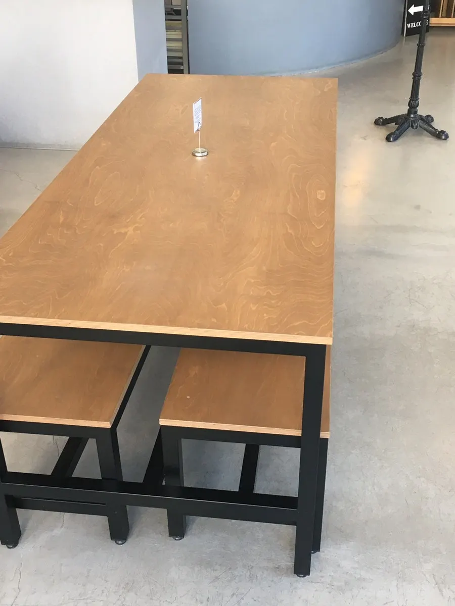 A large table that seats up to 6 people