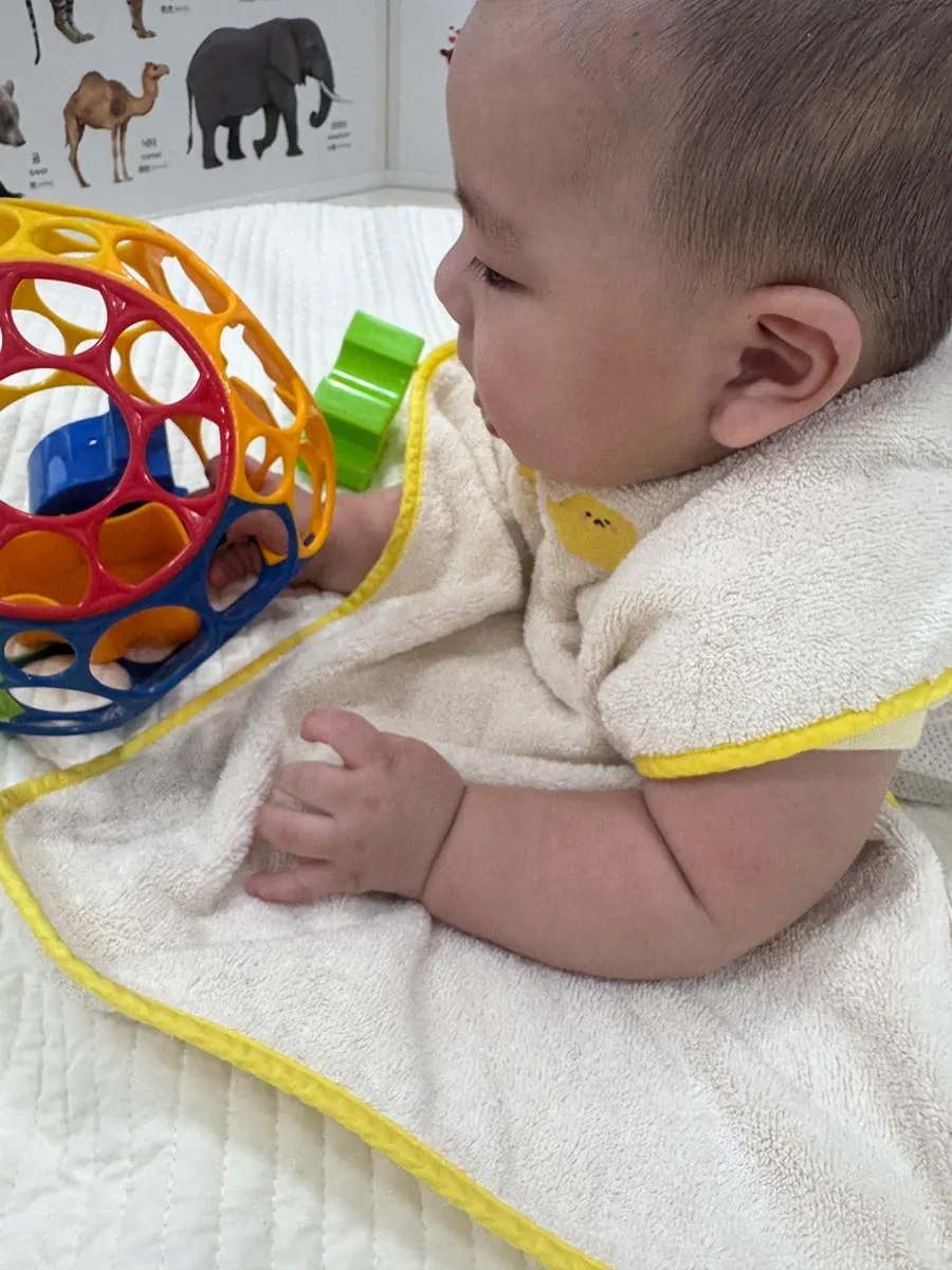 The wash-bib hung around the neck for use as a wash cloth