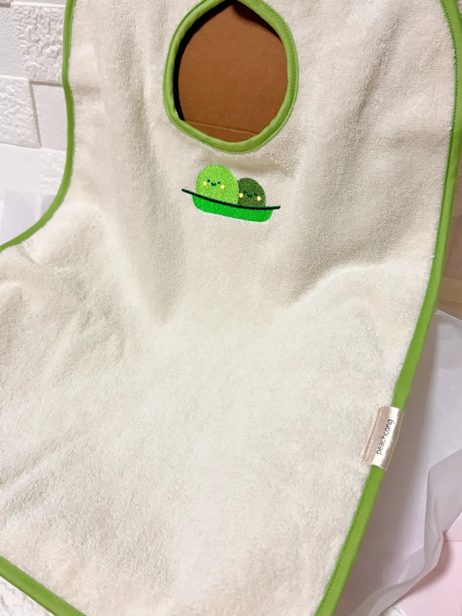 18-month-old using a wash bib for face washing