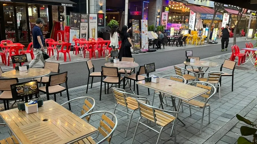 Outdoor tables in front of People & Peoples