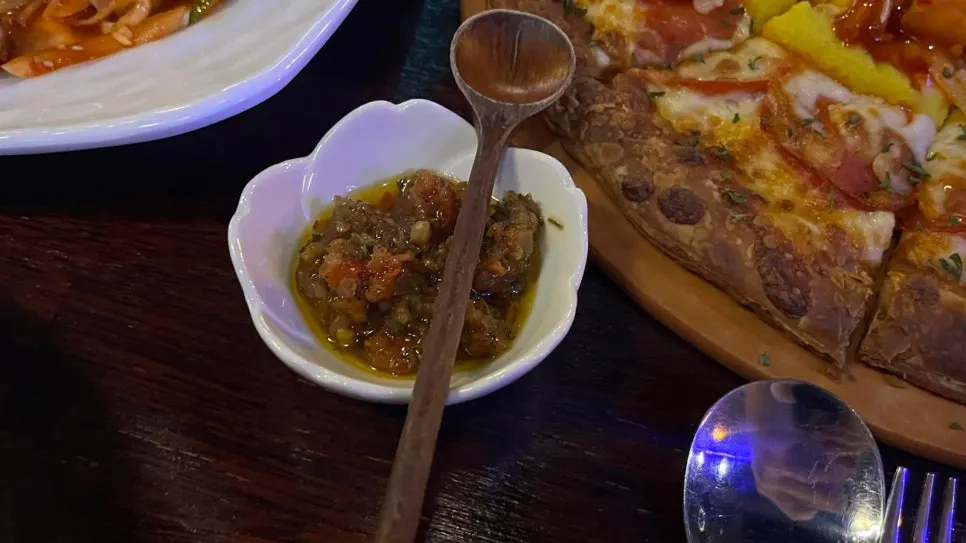 Pastry pizza shared by two at People & Peoples