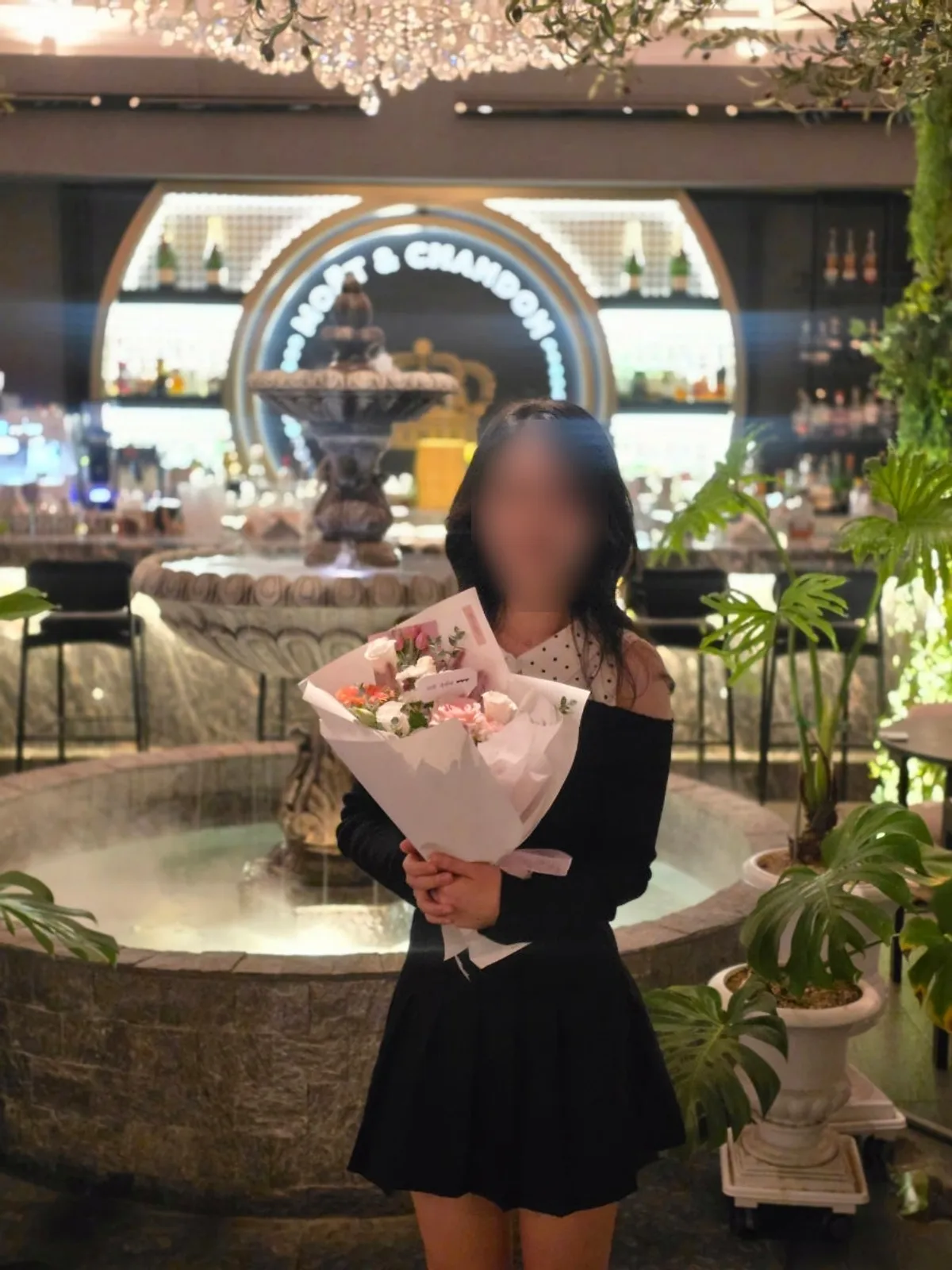 Anniversary photo taken in front of the fountain at Cheongdam's People the Terrace