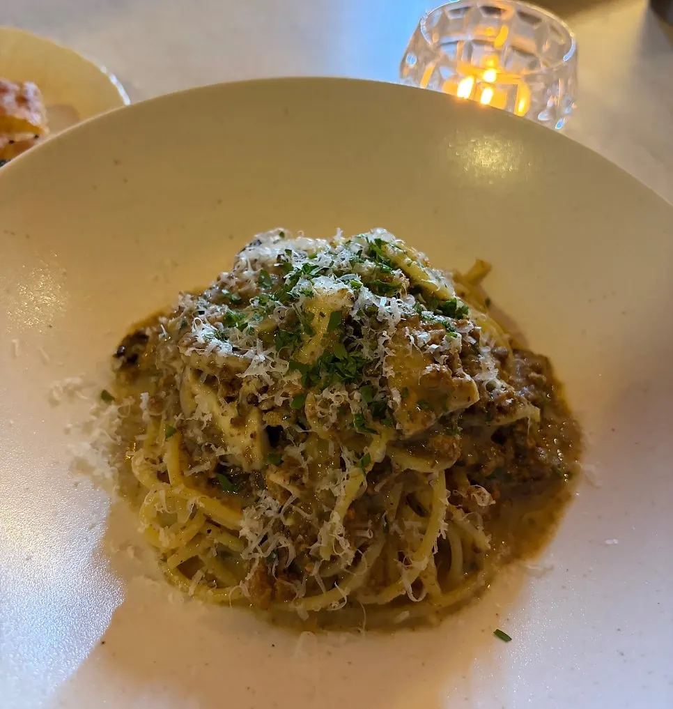 Close-up of white ragu pasta with porcini mushrooms
