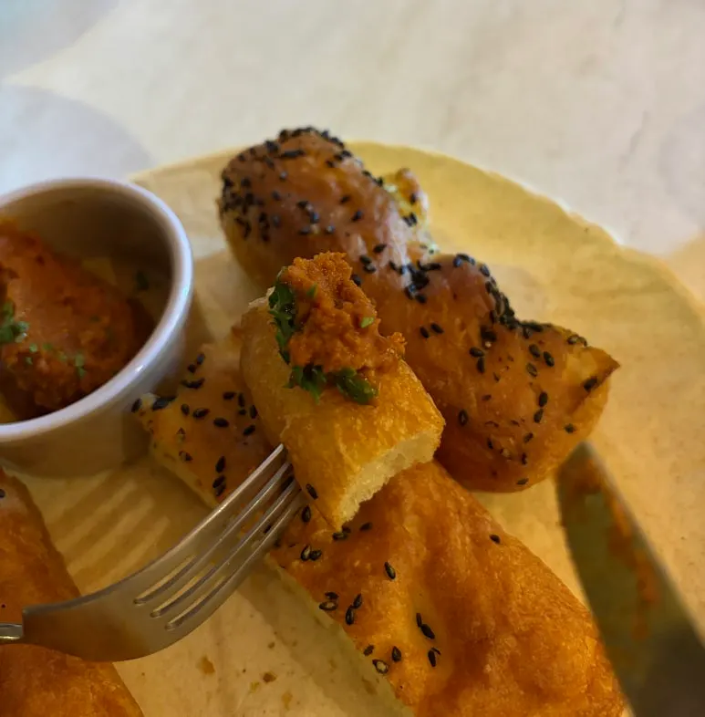 Ciabatta served with a side sauce