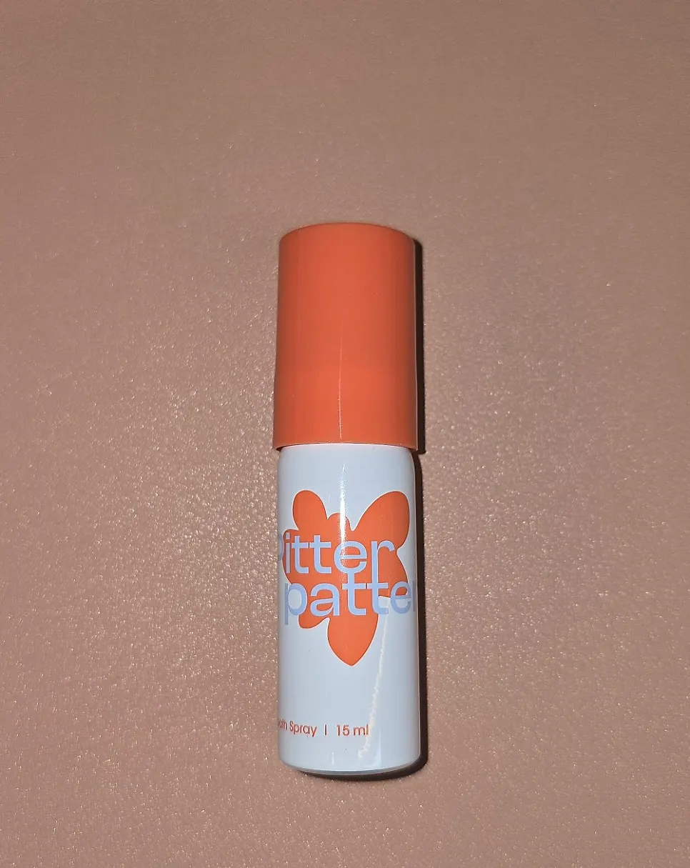 Mouth spray placed next to coffee