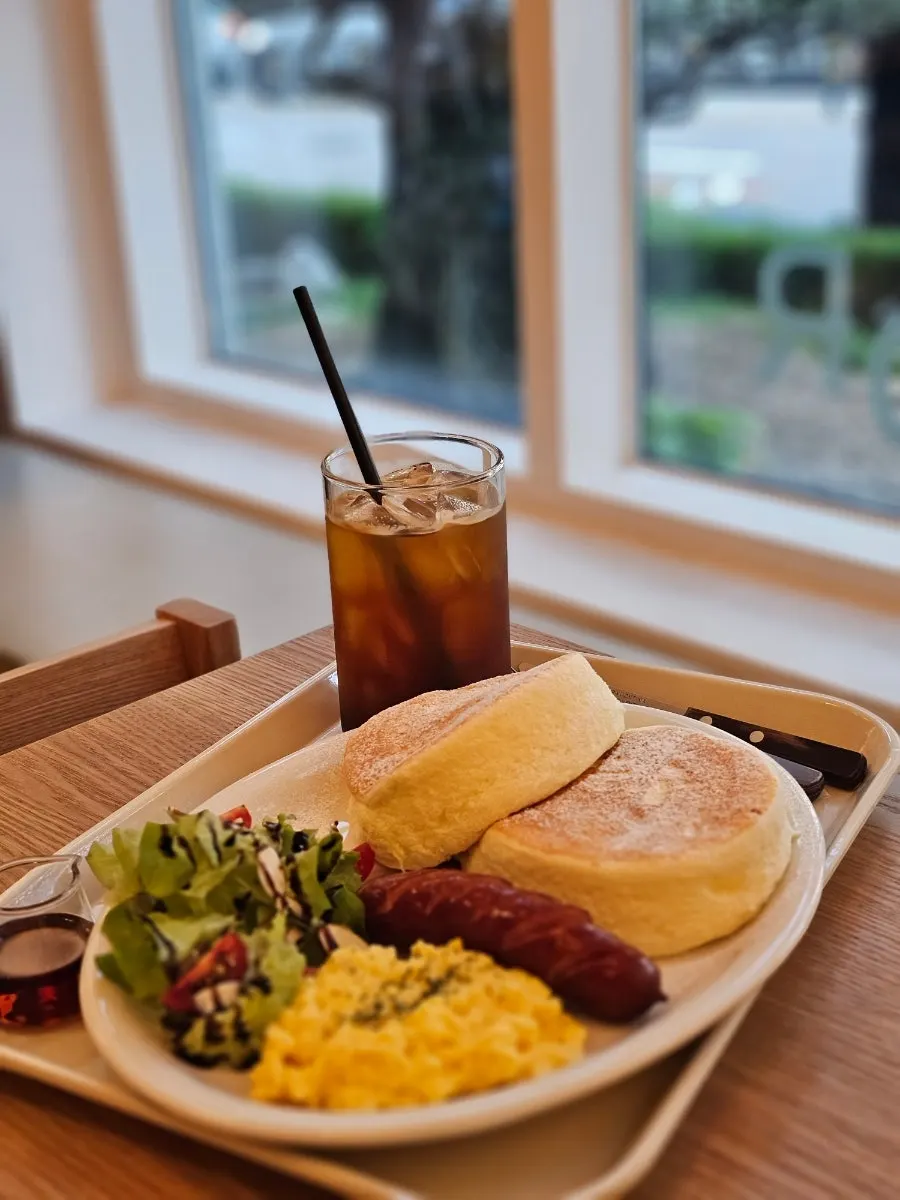 Platter soufflé on the table with trees visible through the window