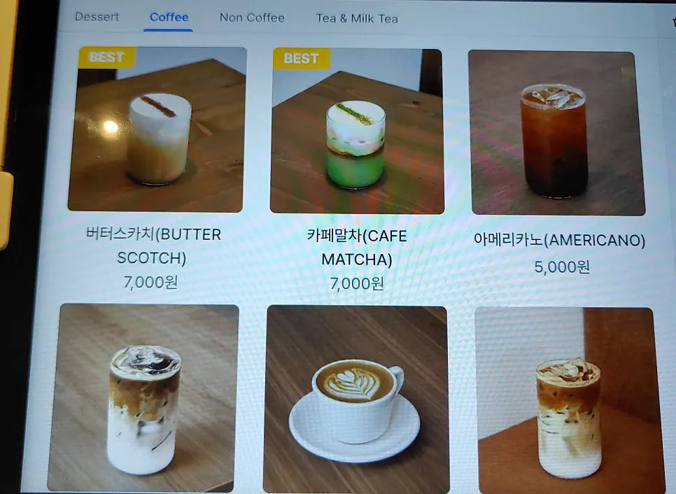 Menu board listing soufflé items