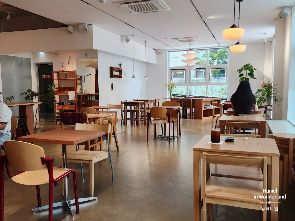 Interior of Petrico with generously spaced tables