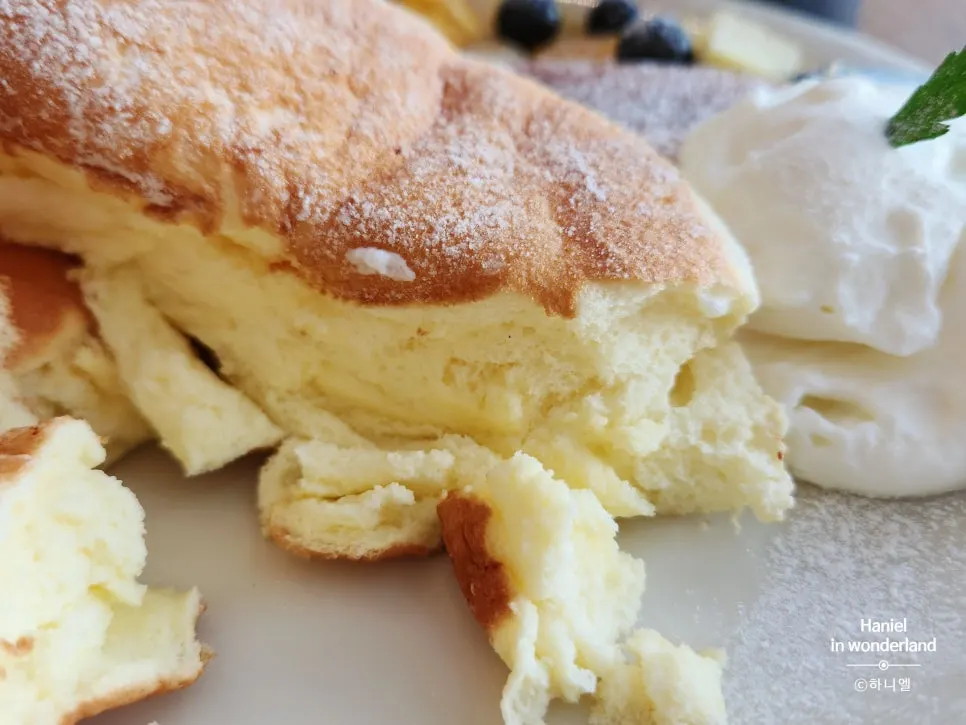 Soufflé pancake cut with a knife