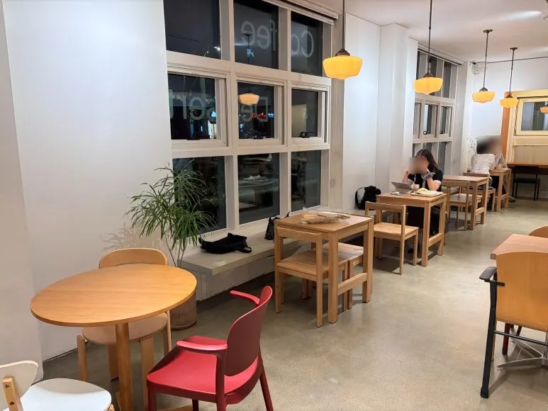 Petrico's interior with wood-tone furniture