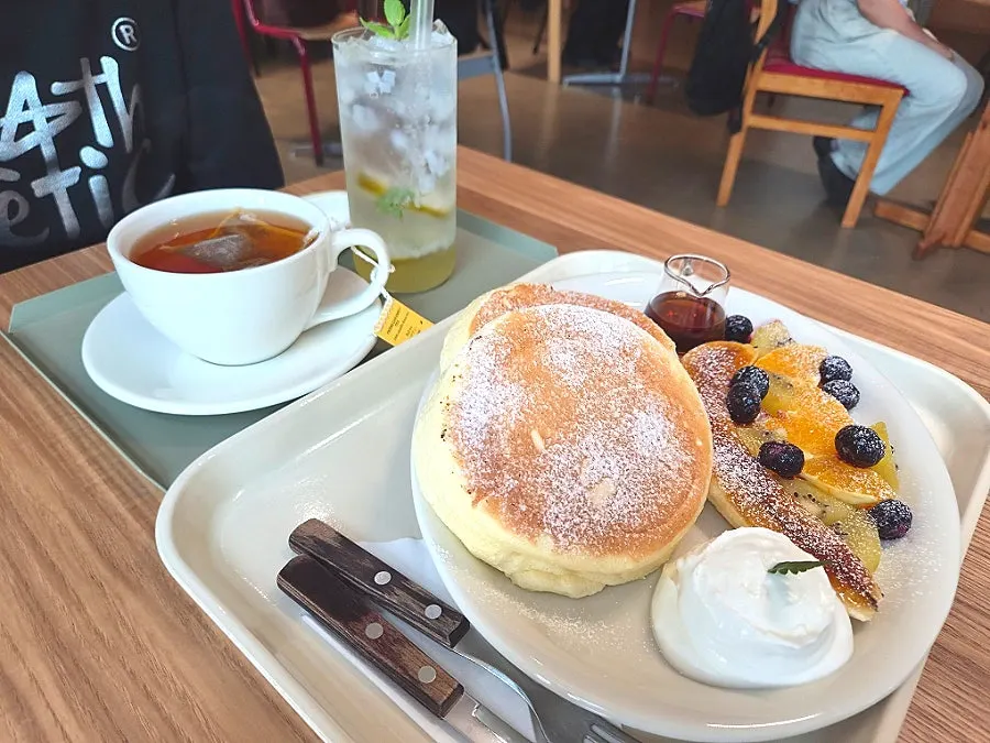 TWG crème caramel tea placed alongside dessert