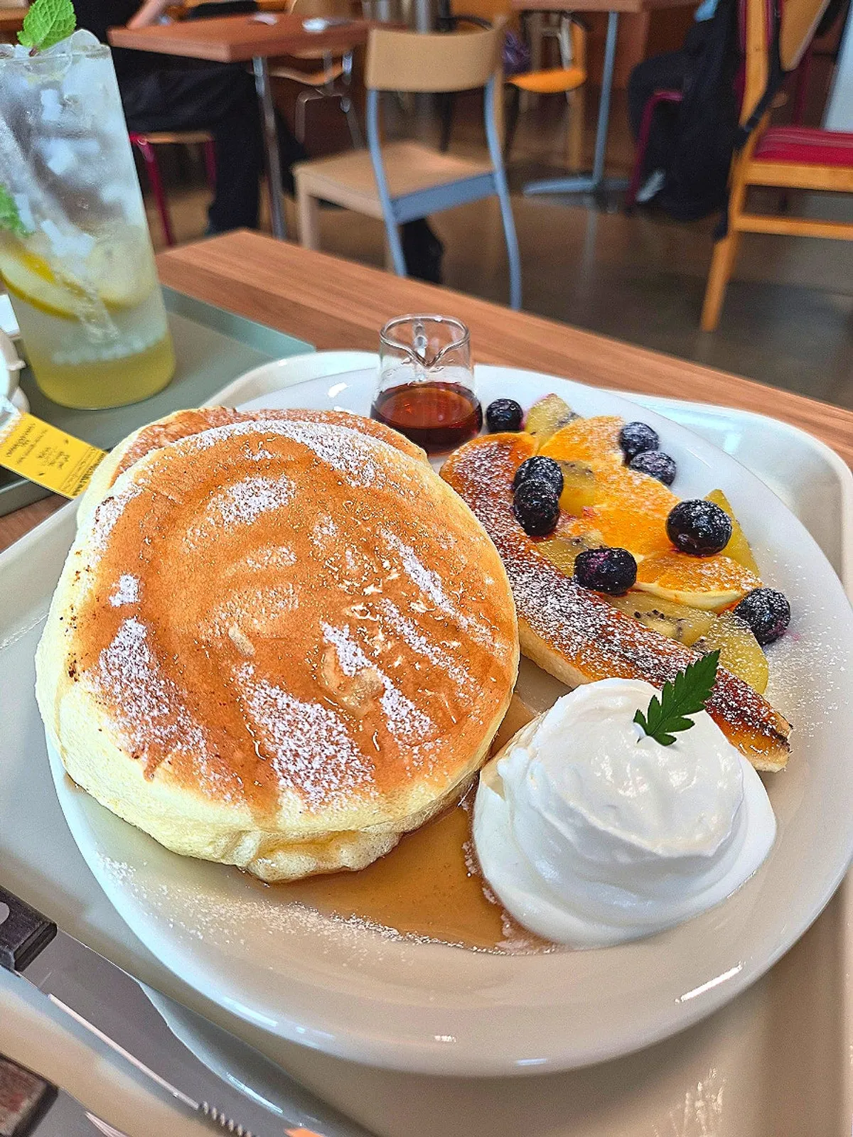 Petrico's fruit soufflé topped with fruit and cream