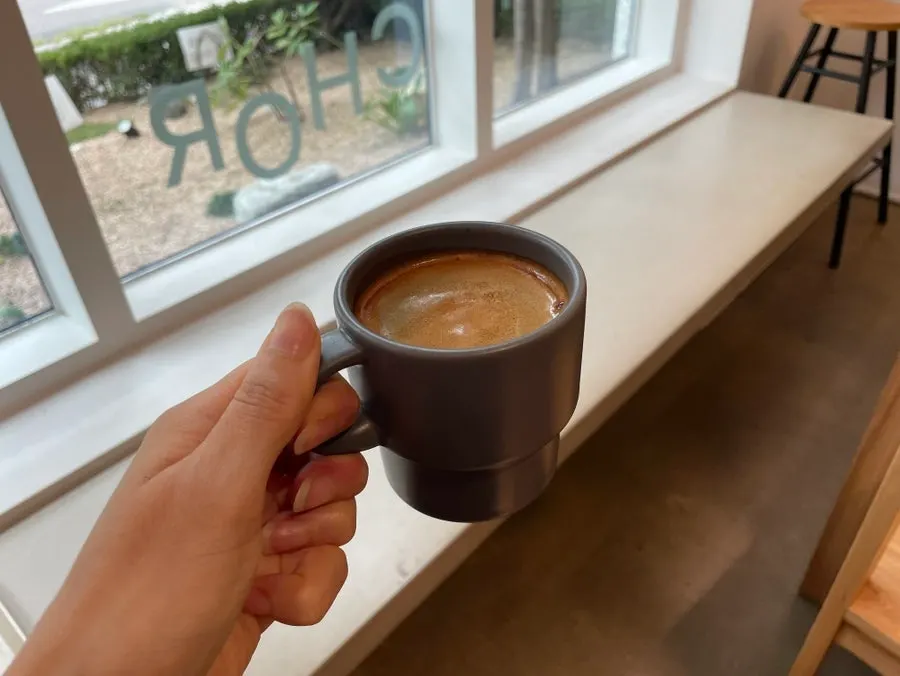 Americano served alongside the soufflé pancake