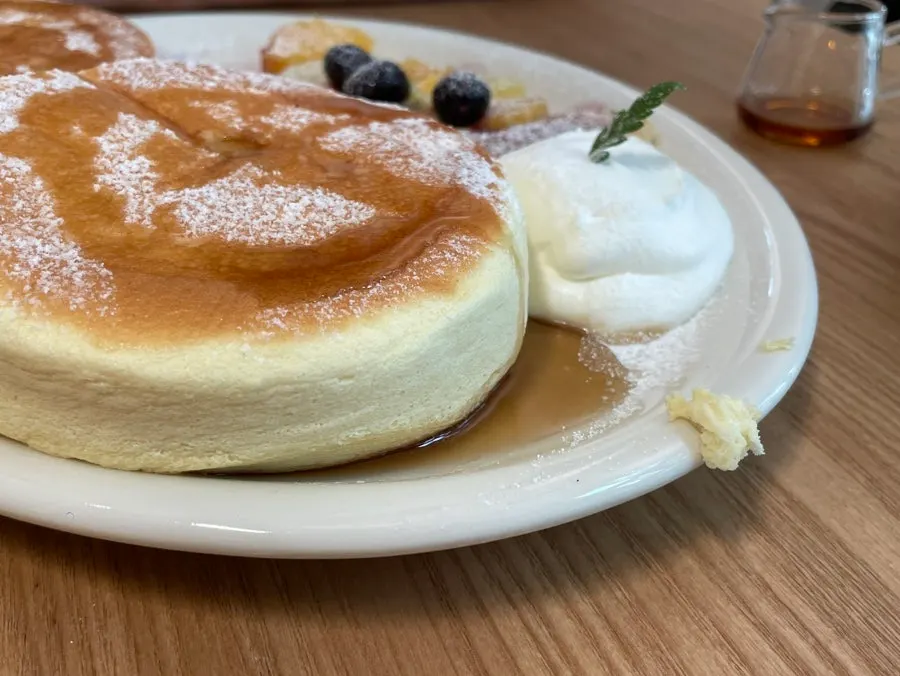 Nearly finished plate of Petrico's fruit soufflé
