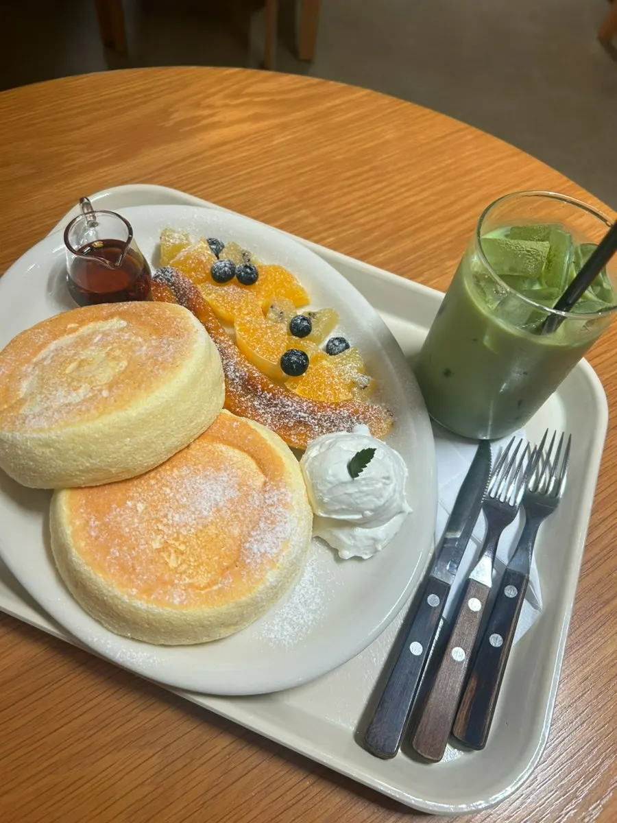 Soufflé and drink options on Petrico's menu board
