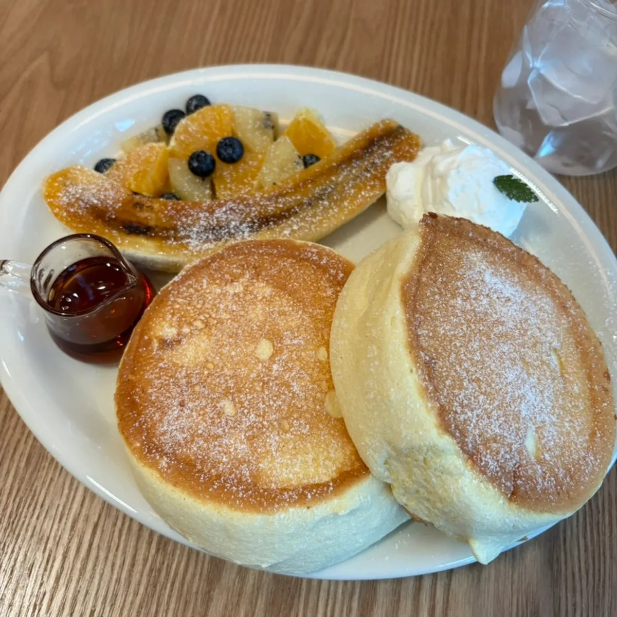 Petrico's fruit soufflé and cold-brew Assam milk tea table setting