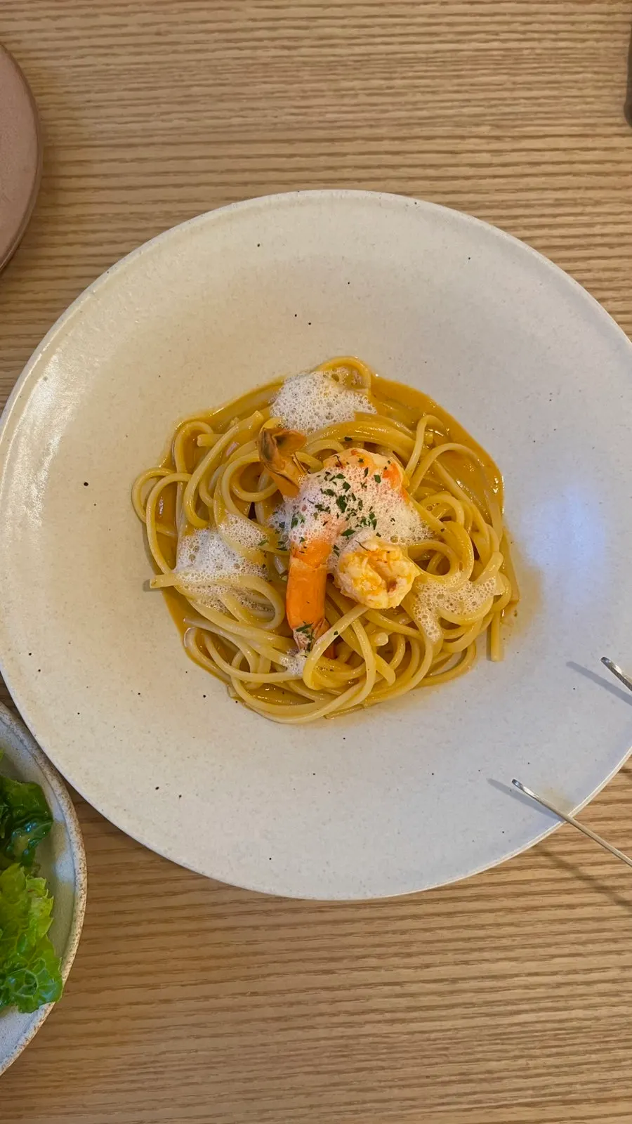 Bisque pasta topped with champagne foam