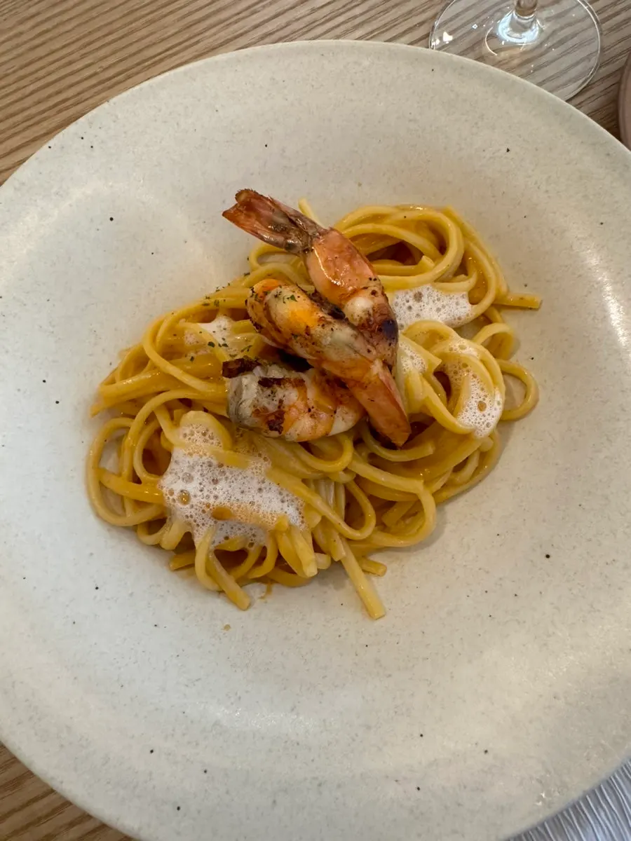 Bisque pasta topped with champagne foam