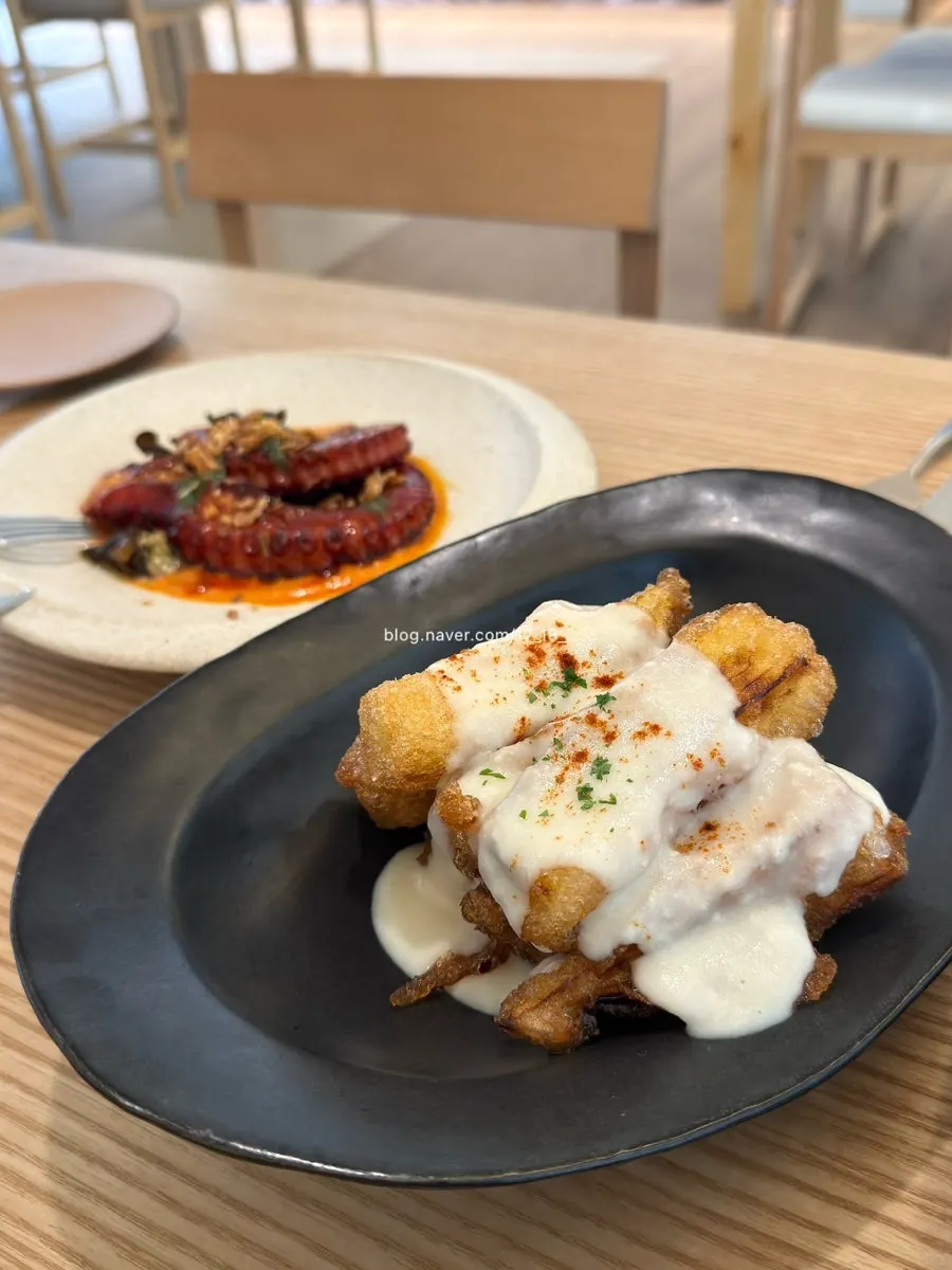 Charcoal octopus with romesco sauce