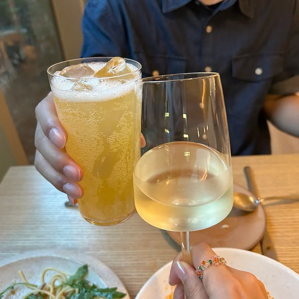 Additional white wine and a non-alcoholic drink ordered