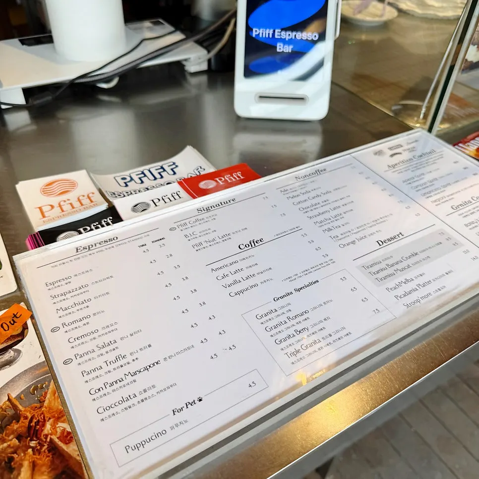 Pip Espresso Bar's coffee and dessert menu board