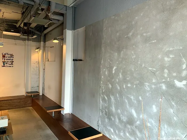 Mini tables and bench seating set up in the corridor