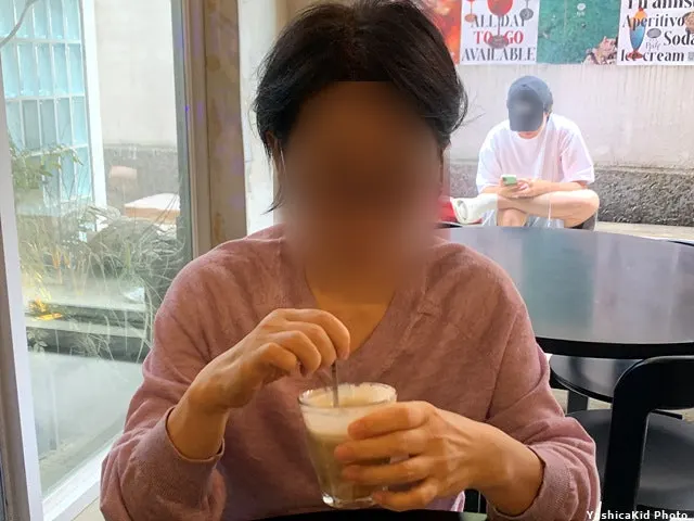 Table scene of conversation over afternoon coffee