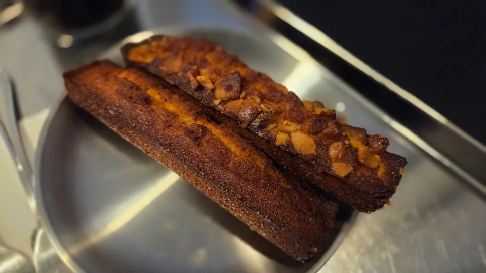 Classic financier with iced Americano