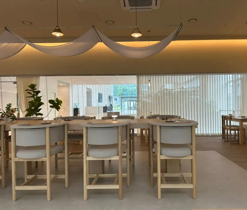Wood-toned dining hall at Pyu Euljiro