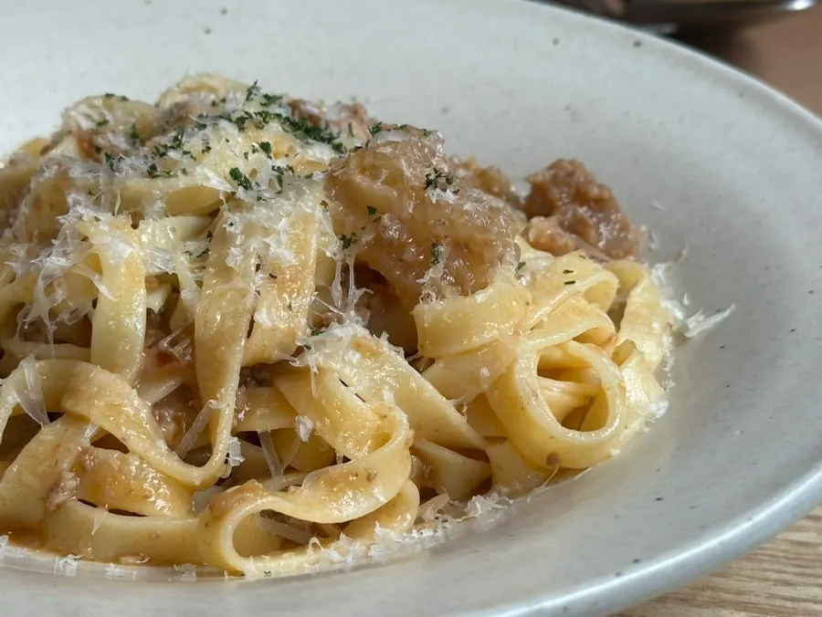 Close-up of ragu sauce and noodles
