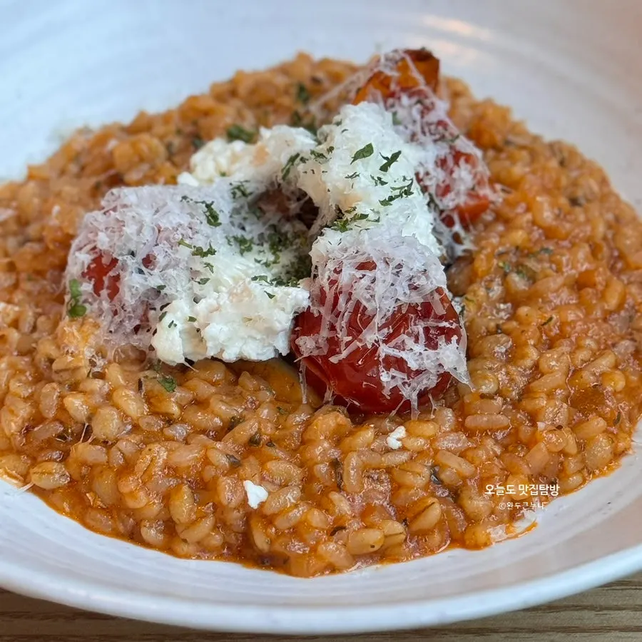 Risotto and grilled dish set on the table